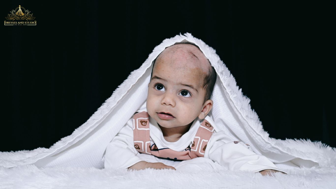 Adorable Moments Captured – Book a Baby Boy Photoshoot with Dresses And Studio